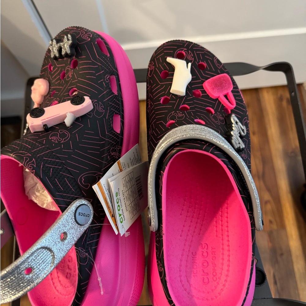 CROCS Black and Pink Sandals with Silver Accents